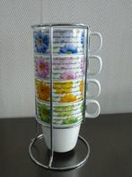 4 Bekers / Mokken in rvs houder gedecoreerd met Bloemen, Huis en Inrichting, Keuken | Servies, Overige typen, Ophalen of Verzenden