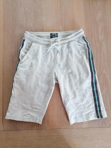 Korte broek van jogging stof mt 146