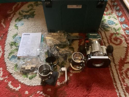 nieuwe Makita body RT001GM205 Boven- en kantenfrees 40V, Doe-het-zelf en Verbouw, Gereedschap | Freesmachines, Nieuw, Accu, Bovenfrees