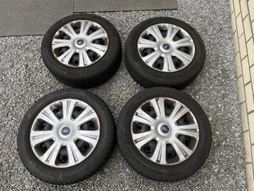 4 Continental Winterbanden 205/55 R 16 H + velgen + kappen beschikbaar voor biedingen