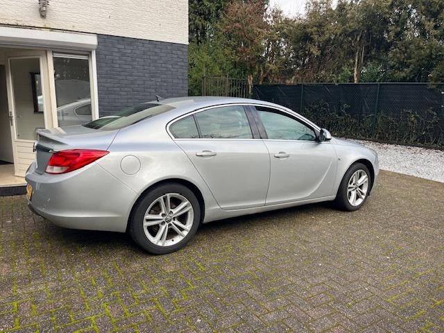 Opel Insignia 1.8 103KW 4-DRS 2010 Grijs, apk tm 18-3-2027., Auto's, Zwart, 4 cilinders, 1796 cc, Leder