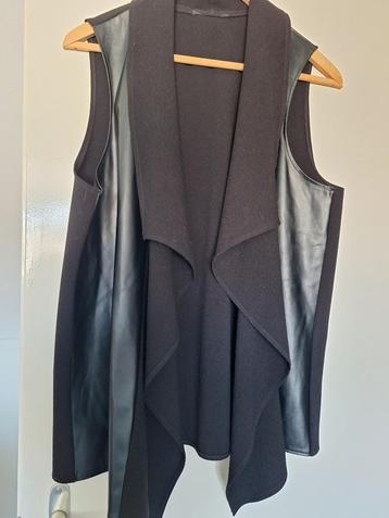 Vest stof/lederlook 52 heuplang. beschikbaar voor biedingen