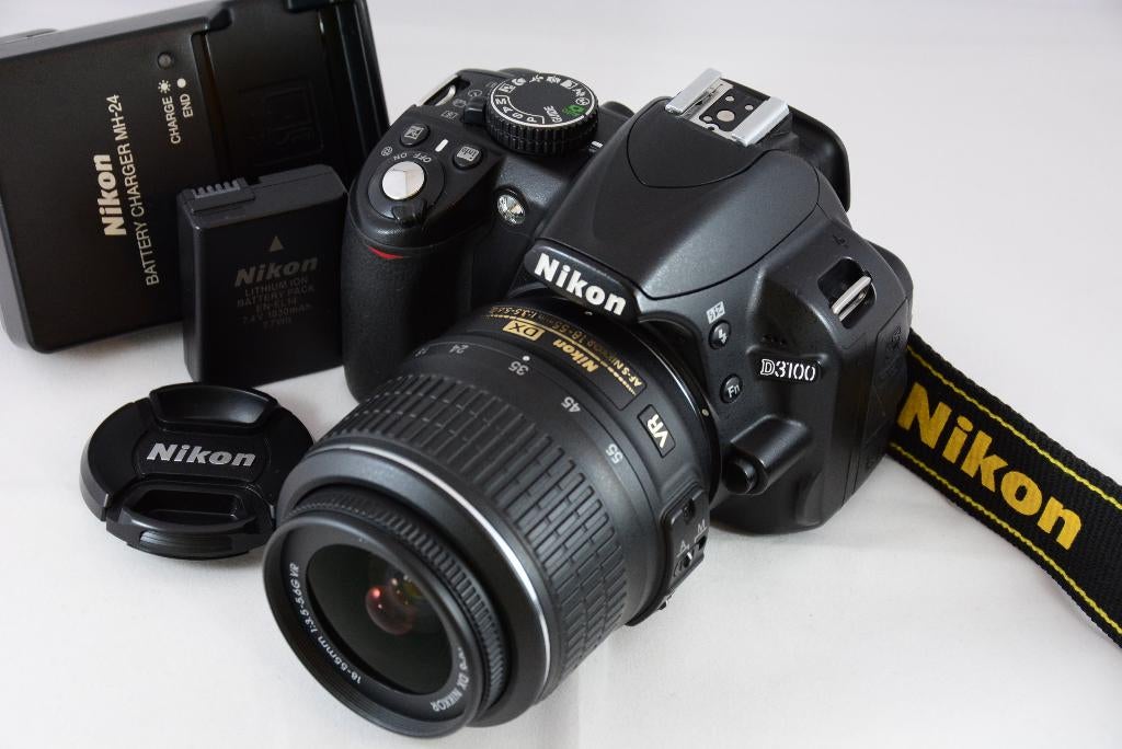 Nikon D3100 met 18-55mm VR kitlens ALS NIEUW 5229 clicks!, 14 Megapixel, Ophalen of Verzenden, Zo goed als nieuw, Nikon