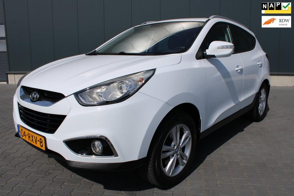 Hyundai Ix35 2.0i Business Edition 2de Eigenaar Trekhaak Cru, Gebruikt, Zwart, 4 cilinders, Leder en Stof