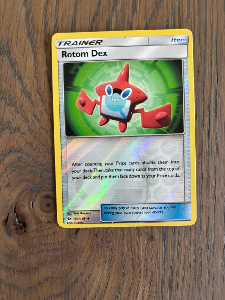 Pokémon TCG: Rotom Dex Trainer Kaart (131/149) Foil, Ophalen of Verzenden, Zo goed als nieuw, Losse kaart, Foil