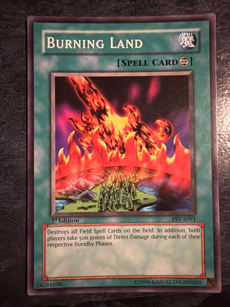 Yu-Gi-Oh! Burning Land - 1st Edition Spell Card PSV-E061, Ophalen of Verzenden, Gebruikt, Losse kaart