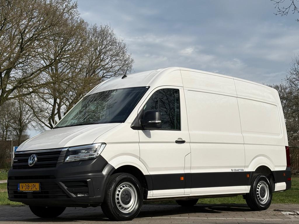Volkswagen CRAFTER E-Crafter L2H3 36 kWh|100% elektrisch|cru, Auto's, Bestelauto's, Gebruikt, Zwart, Volkswagen, Wit