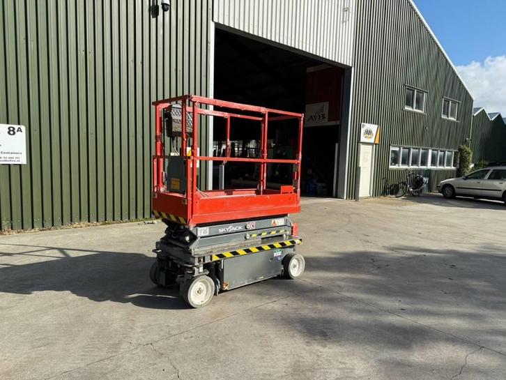 Skyjack SJ 3215 6,4 meter schaarhoogwerker (bj 2021), Zakelijke goederen, Machines en Bouw | Liften, Steigers en Ladders