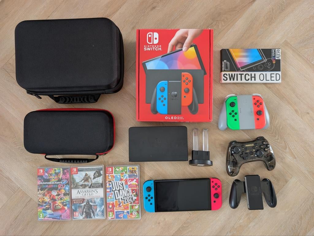 Nintendo Switch OLED met oa Mario Kart Deluxe en veel acc, Gebruikt, Overige genres, Ophalen of Verzenden, 3 spelers of meer