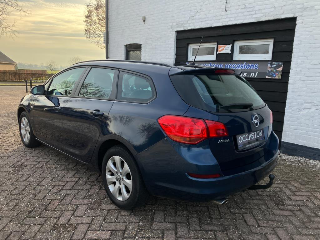 Opel Astra Sports Tourer 1.4 TURBO Edition 140PK 2e EIG. cru, Auto's, Voorwielaandrijving, Stof, Gebruikt, Zwart
