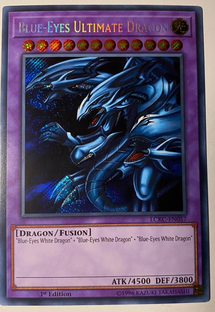 Yu-Gi-Oh! Blue-Eyes Ultimate Dragon LCKC 1st Foil Bleed 🩸, Hobby en Vrije tijd, Verzamelkaartspellen | Yu-gi-Oh!, Ophalen of Verzenden