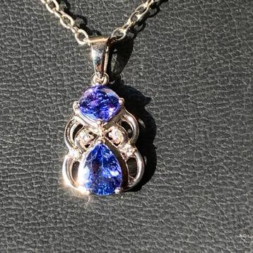 Tanzaniet engel hanger geluk beschermt intuïtie eyecatcher beschikbaar voor biedingen