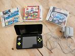 New Nintendo 2DS XL met drie games en oplader, Spelcomputers en Games, Spelcomputers | Nintendo 2DS en 3DS, Ophalen of Verzenden