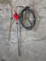 Handpomp voor 200 liter olievat, Ophalen