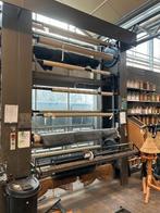 Paternoster tapijt stelling, Ophalen