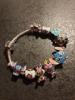 Armband Stitch met bedeltjes 17cm, Sieraden, Tassen en Uiterlijk, Armbanden, Ophalen of Verzenden, Nieuw, Zilver, Met bedels of kralen