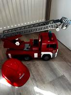 Bruder brandweerwagen met brandweerhelm, Kinderen en Baby's, Speelgoed | Speelgoedvoertuigen, Ophalen of Verzenden, Zo goed als nieuw