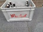 Grolsch bierkrat met 7 beugelflessen, Ophalen