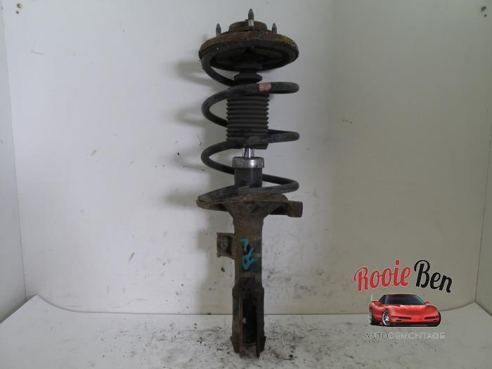 Schokdemperpoot rechts-voor van een Mitsubishi Lancer, Auto-onderdelen, Ophanging en Onderstel, Mitsubishi, Gebruikt, 3 maanden garantie