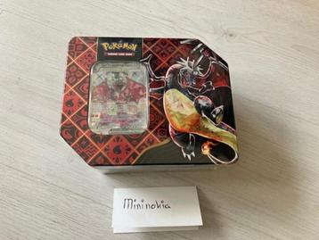 Paldean Fates Charizard Tin Pokemon beschikbaar voor biedingen