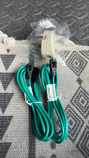 Telefoon kabels + adapter beschikbaar voor biedingen