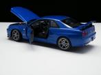 Nieuw modelauto Nissan Skyline GT-R R34 – Welly 1:24, Hobby en Vrije tijd, Modelauto's | 1:24, Auto, Nieuw, Ophalen of Verzenden