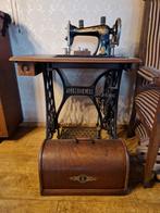 Singer trapnaai machine, Ophalen