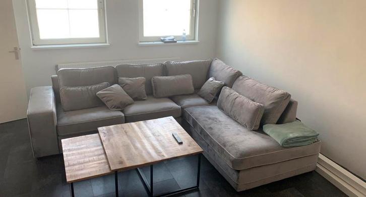 Grijze hoekbank - Vierpersoons of meer, Huis en Inrichting, Banken | Bankstellen, Zo goed als nieuw, Hoekbank, Vierpersoons of meer