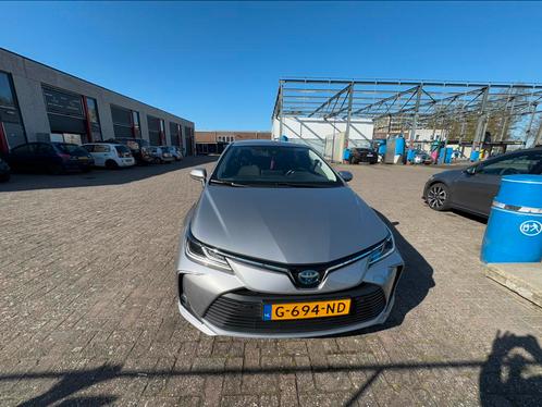 Toyota Corolla 1.8 Hybrid 122pk CVT 2019 Grijs, Auto's, Toyota, Particulier, Corolla, ABS, Achteruitrijcamera, Adaptieve lichten