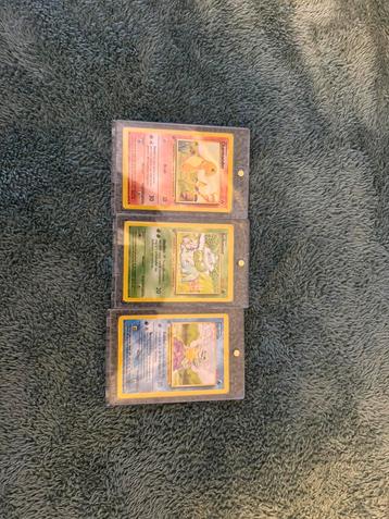 Eerste editie base set trio beschikbaar voor biedingen