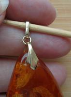 grote barnsteen hanger met 8 krt gouden oog [245], Verzenden, Zo goed als nieuw, Met edelsteen, Goud