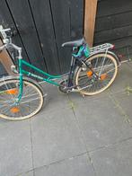 Dames fiets uit een schuur gevonden, Ophalen