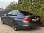 BMW 3-serie 320i Executive Modern Navigatie, Auto's, Automaat, Achterwielaandrijving, 4 cilinders, Leder en Stof