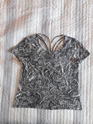 Zwart/wit tuniek met aparte rug. Merk: Cache Cache. Maat: M. beschikbaar voor biedingen
