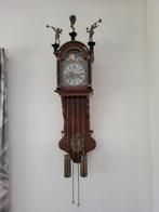 Eiken Friese staartklok, Ophalen, Wandklok