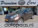 Kia Rio 1.4 CVVT 110PK Plus Pack|Automaat|Airco|Nav|Dealeron, Auto's, Kia, Euro 5, Gebruikt, Zwart, 4 cilinders