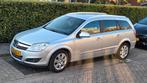 Opel Astra 1.6 16V 85KW St.wgn. 2010 Grijs, Auto's, Voorwielaandrijving, 15 km/l, Zwart, Stationwagon