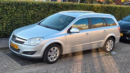 Opel Astra 1.6 16V 85KW St.wgn. 2010 Grijs, Auto's, Opel, Astra, Airconditioning, Centrale vergrendeling, Cruise Control, Dakrails