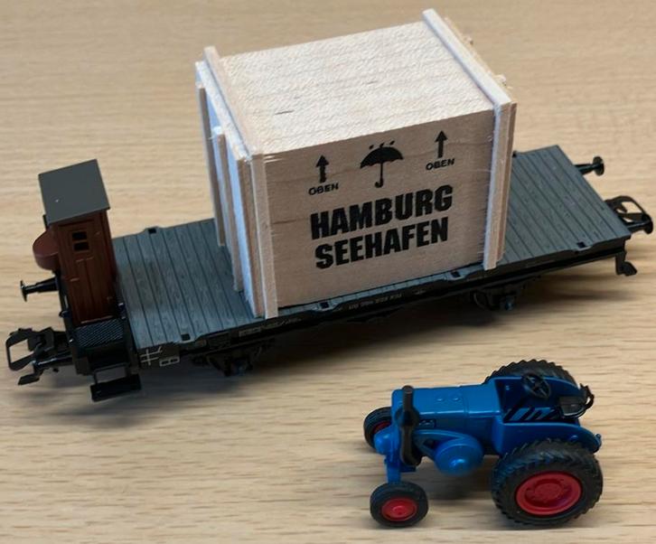 Märklin 46843 platte wagon met Lanz tractor, Hobby en Vrije tijd, Modeltreinen | H0, Nieuw, Wagon, Wisselstroom, Märklin, Ophalen of Verzenden