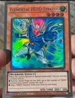 Yu-Gi-Oh! Elemental HERO Stratos MAGO 1st Edition !, Hobby en Vrije tijd, Verzamelkaartspellen | Yu-gi-Oh!, Verzenden, Zo goed als nieuw