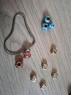 Nieuwe bedels en armband grote gat kralen sterrenbeeld, Pandora, Ophalen of Verzenden, Zo goed als nieuw, 4 bedels of meer