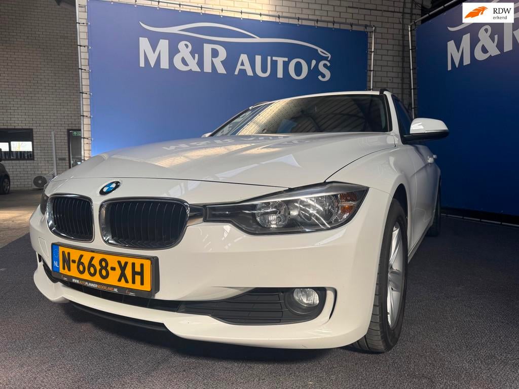 BMW 3-serie Touring 316i Executive Nieuwe APK, Auto's, Gebruikt, Euro 6, 4 cilinders, Wit