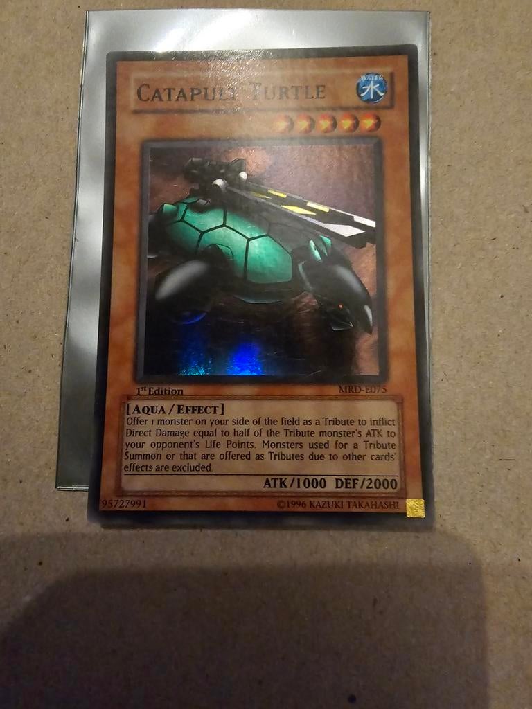 Yu-Gi-Oh! Catapult Turtle MRD-E075 1st Edition Foil, Ophalen of Verzenden, Zo goed als nieuw, Losse kaart, Foil