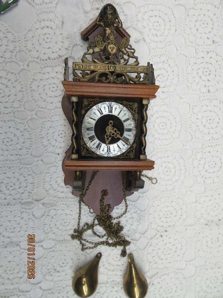 Wuba zaanse klok, Ophalen