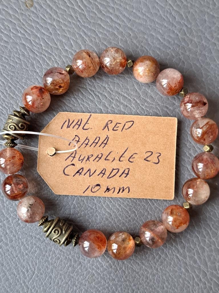 632 edelsteen armband natuurlijke rode Auraliet 23 - Canada, Nieuw, Ophalen of Verzenden, Elastiek, Met edelsteen