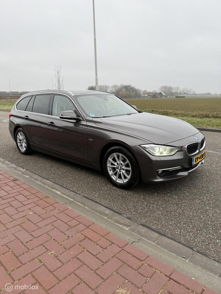 BMW 3-serie Touring 318d High Executive, Auto's, BMW, Bruin, Leder, 1470 kg, 3-Serie