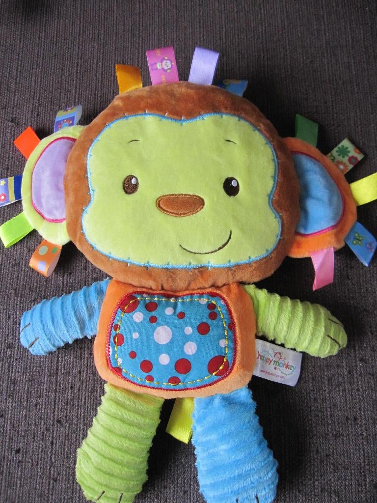 Happy monkey aap met labeltjes en rammel Jing Bao toys 4,--, Ophalen of Verzenden, Zo goed als nieuw, Overige typen