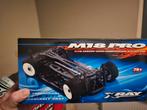 XRAY M18 PRO CARBON COMPETITIE 1:18 4WD, Ophalen of Verzenden, Overige schalen, Elektro, Auto onroad