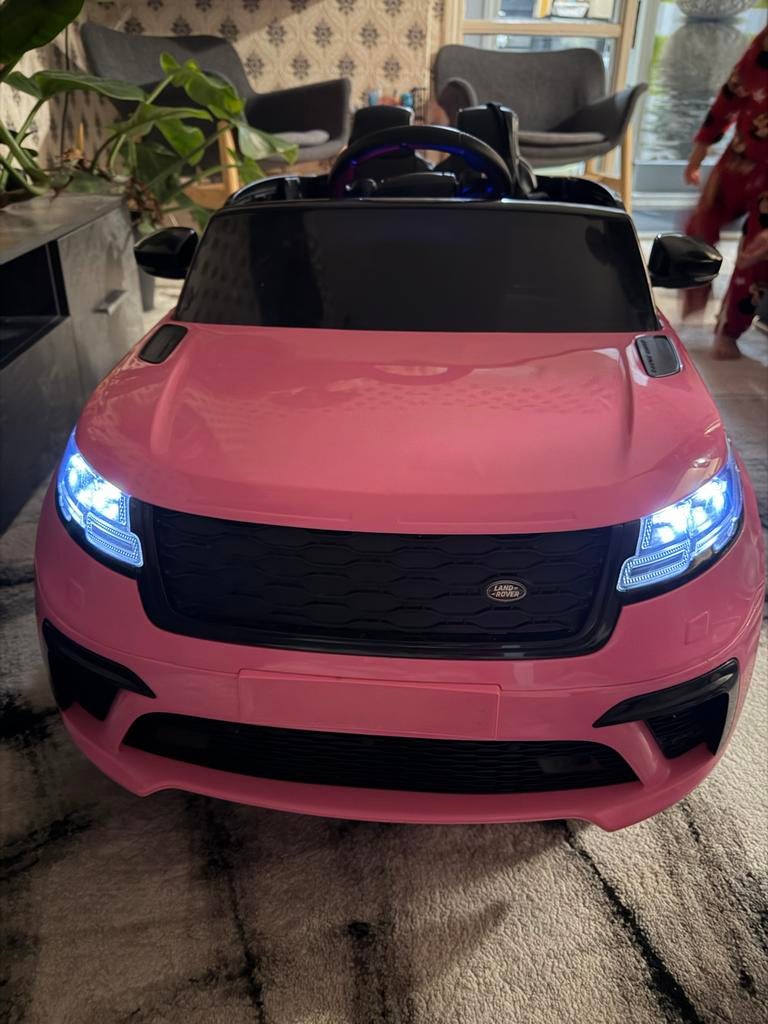 Roze elektrische kinderauto Range Rover Velar, Kinderen en Baby's, Speelgoed | Buiten | Accuvoertuigen, Ophalen of Verzenden, Gebruikt
