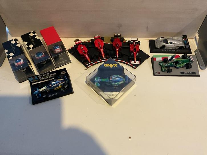 1:43 F1 Schumacher collectie plus helmen 1:8, Verzamelen, Automerken, Motoren en Formule 1, Zo goed als nieuw, Formule 1, Ophalen of Verzenden